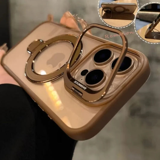 Gold phone case with ring holder on a blurred background