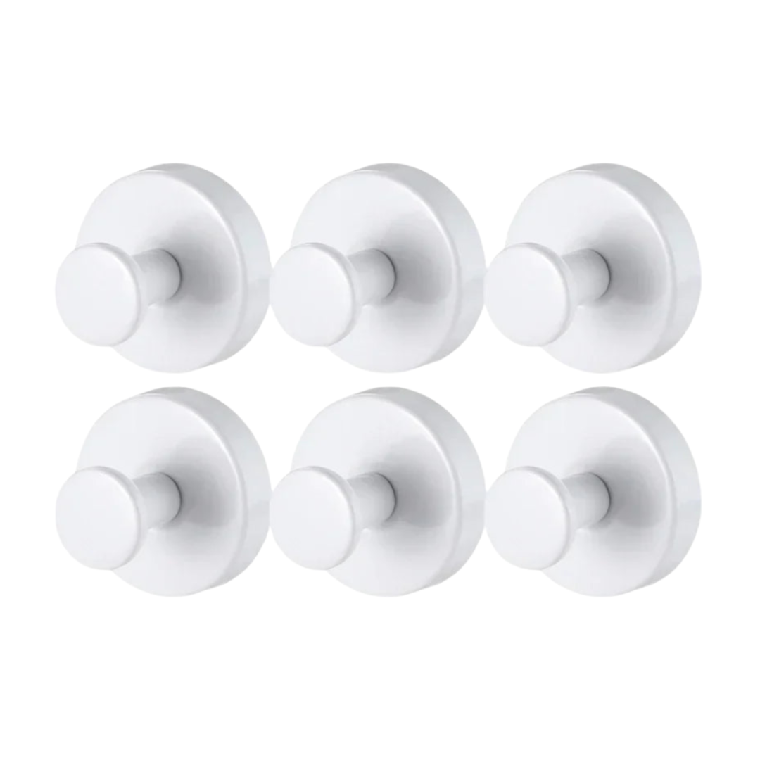 Six white door knobs on a white background